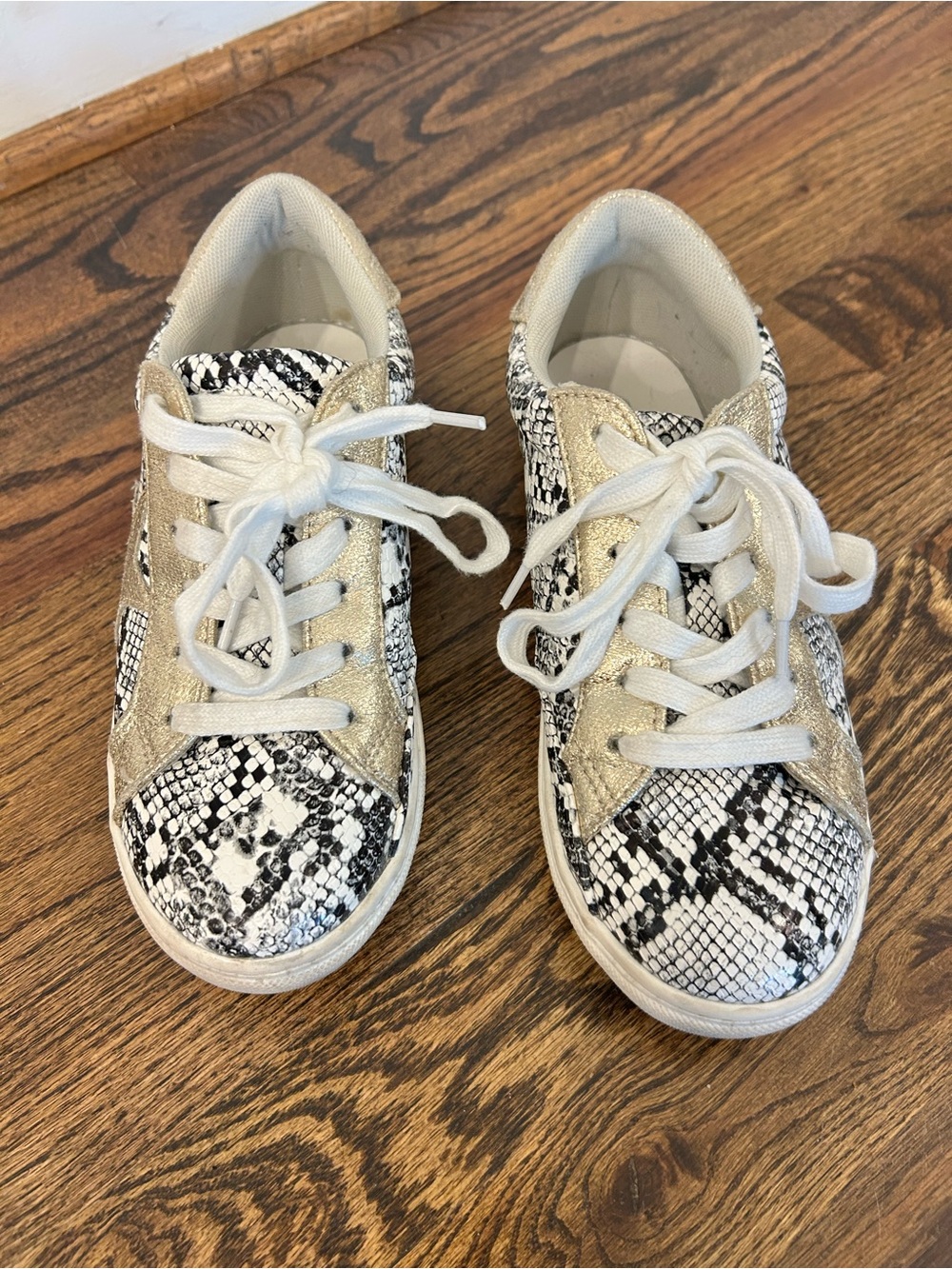 Black and White Snake Print Sneakers with Gold Accents